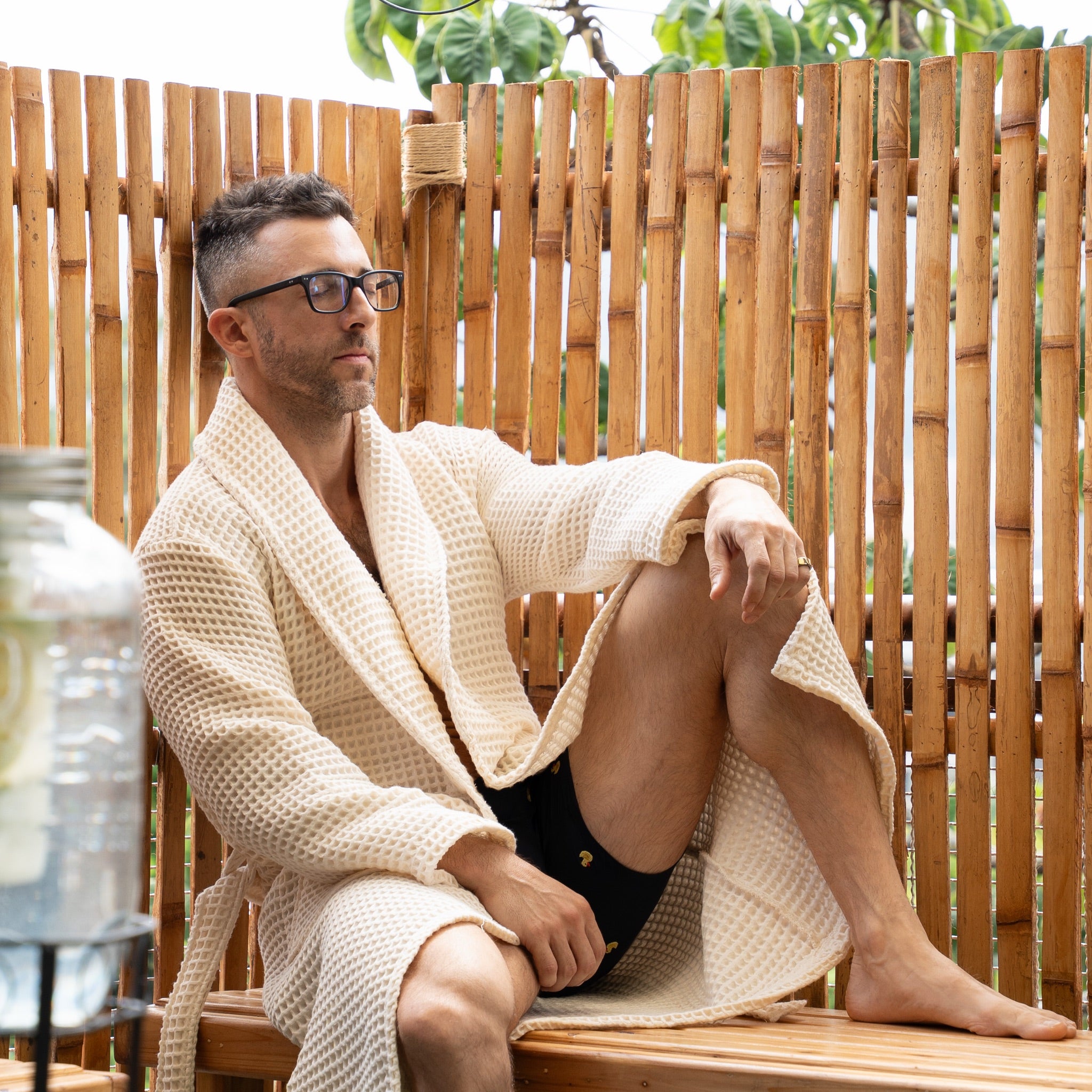 Cooling down outdoors in The Sauna Robe in Arctic Ivory after a sauna session