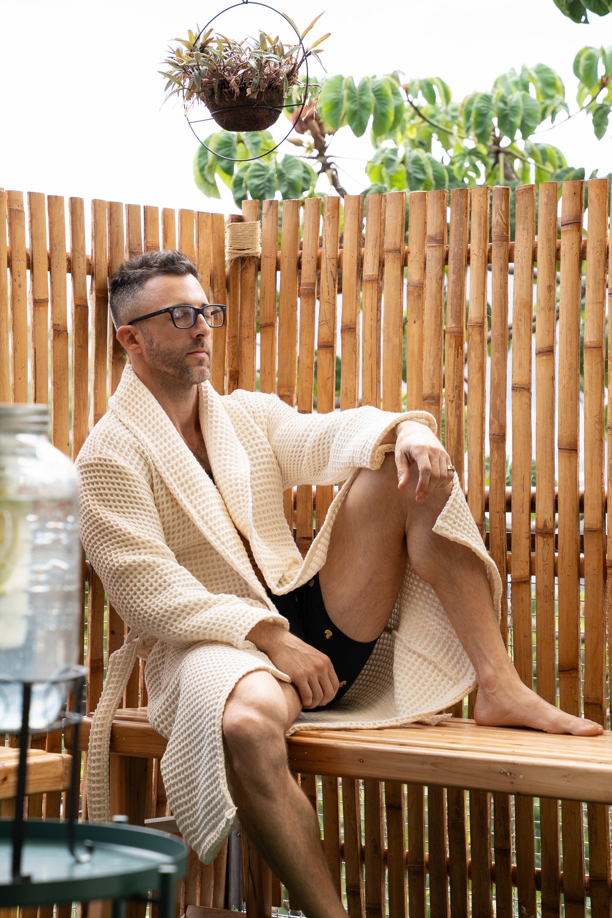 Cooling down outdoors in The Sauna Robe in Arctic Ivory after a sauna session